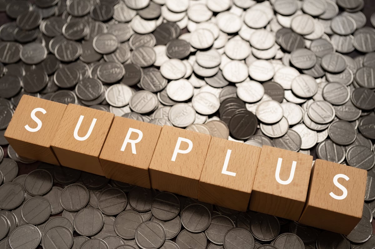 Surplus funds concept with coins